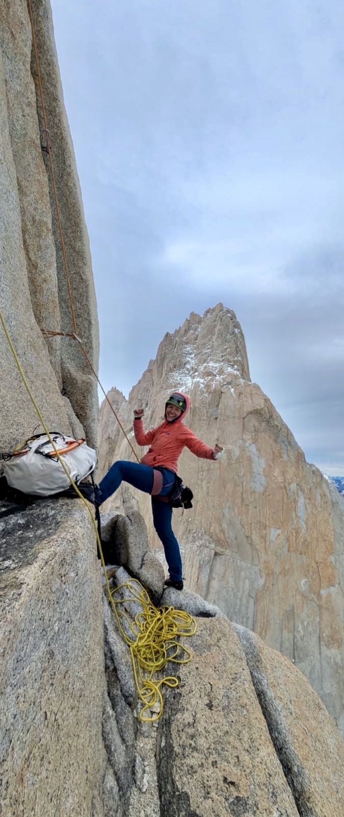 Marta celebrating on a Patagonia spire
