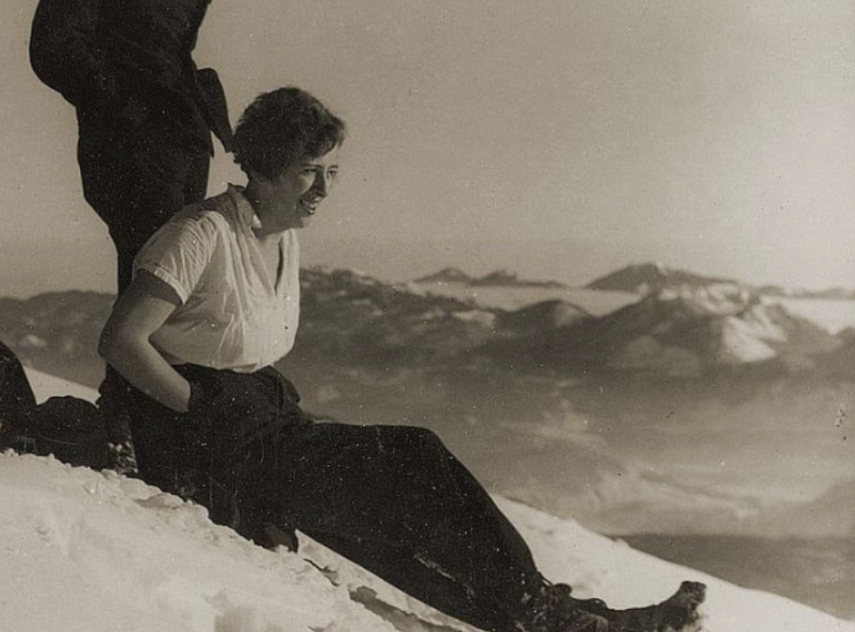Pavla Jesih resting on a snowy summit, a historic black-and-white photograph